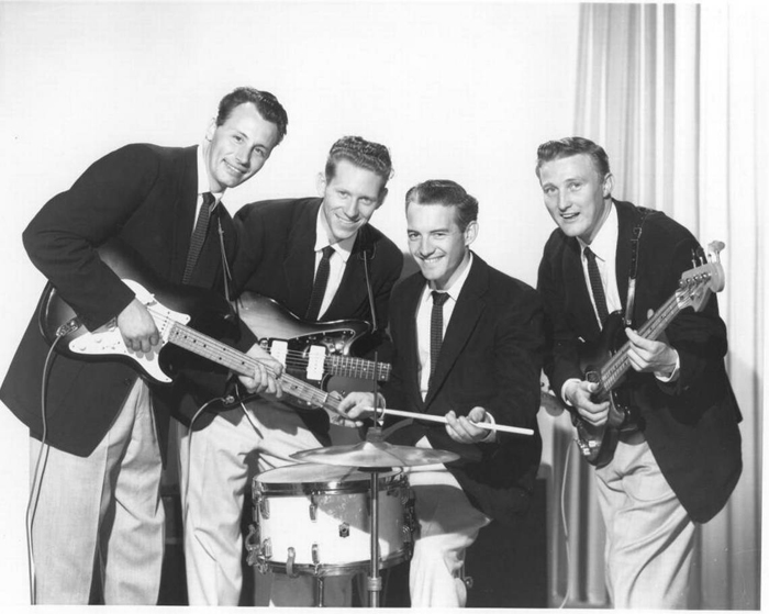 A group of men in suits and ties playing instruments.